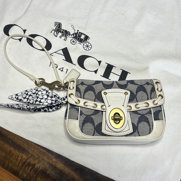 Coach Handbags - NWOT Coach Resort Blue Denim Signature Whipstitch Capacity Wristlet Clutch $278